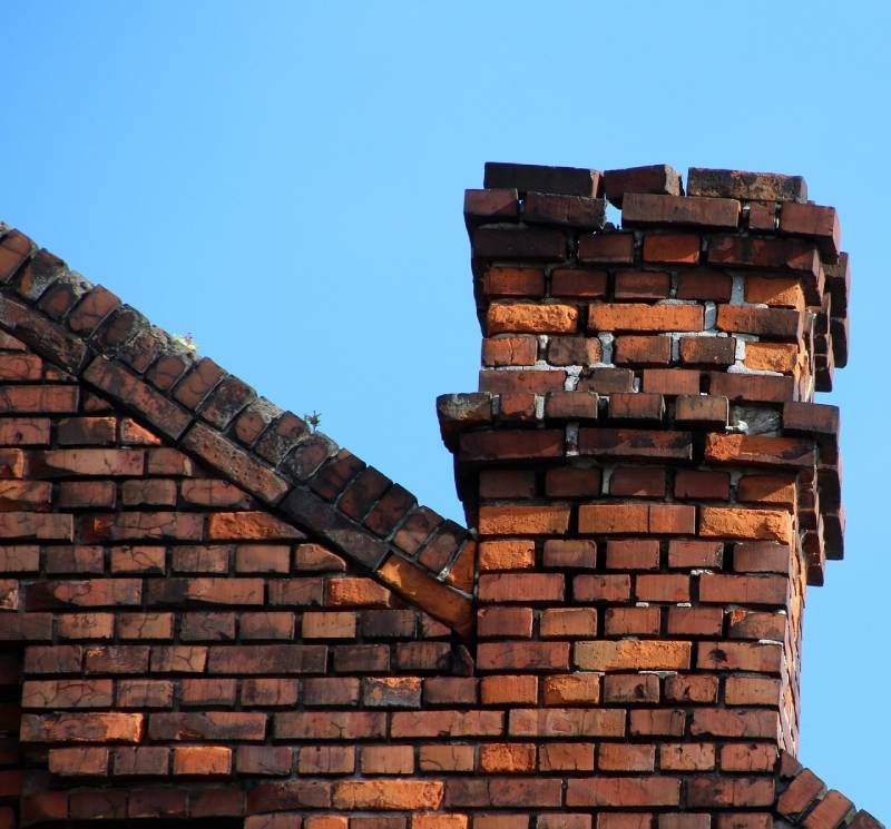 Signs Your North Hollywood Home Needs a Chimney Inspection Damaged chimney on an North Hollywood home showing cracks and missing mortar